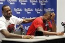 Miami Heat 's LeBron James , left, and Dwyane Wade react during a basketball news conference, Tuesday, June 14, 2011 in Miami. Instead of hosting Game 7 of the NBA finals on Tuesday, the Heat packed up their stuff for the summer.