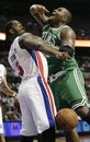 Detroit Pistons ' Rodney Stuckey (3) knocks the ball from Boston Celtics ' Glen Davis in the first half of an NBA basketball game Tuesday, Nov. 2, 2010, in Auburn Hills, Mich. The Celtics defeated the Pistons 109-86.