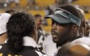 Philadelphia Eagles quarterback Michael Vick (7) right, talks with Pittsburgh Steelers safety Troy Polamalu (43) at midfield after the NFL preseason football game on Thursday, Aug. 18, 2011 in Pittsburgh. The Steelers won 24-14.