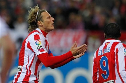 Atletico De Madrid's Diego Forlan From Uruguay, Reacts