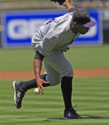 Colorado Rockies Pitcher Juan Nicasio Can't Pick Up The Ball Hit By San Diego Padres' Jason Bartlett