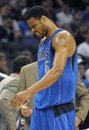 Dallas Mavericks center Tyson Chandler leaves the court after cutting his thumb during the first half of a preseason NBA basketball game against the Orlando Magic in Orlando, Fla., Wednesday, Oct. 20, 2010. The Magic won 101-76.