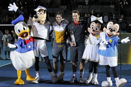 Switzerland's Roger Federer, Center Right, And Spain's Rafael Nadal, Center Left, Pose With Disney Characters