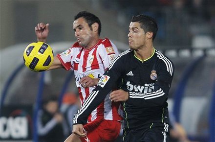 Real Madrid's Cristiano Ronaldo From Portugal, Right, Vies