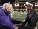 Kansas State head coach Bill Snyder, left, shakes hands with Oklahoma State head coach Mike Gundy, right, following their NCAA college football game in Stillwater, Okla., Saturday, Nov. 5, 2011. Oklahoma State won 52-45.