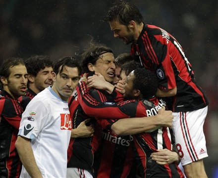 AC Milan Forward Zlatan Ibrahimovic, Of Sweden, Center, Celebrates With Teammates AC Milan Defender Marek Jankulovski,