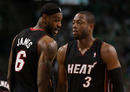 BOSTON, MA - MAY 09: LeBron James #6 talks with teamamte Dwyane Wade #3 of the Miami Heat in Game Four of the Eastern Conference Semifinals in the 2011 NBA Playoffs on May 9, 2011 at the TD Garden in Boston, Massachusetts.  The Miami Heat defeated the Boston Celtics 97-90 in overtime. (Photo by Elsa/Getty Images)