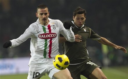 Juventus' Leonardo Bonucci, Left, Fights