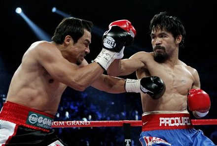 Manny Pacquiao, Right, Of The Philippines, Hits
