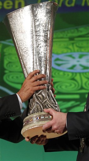 UEFA President Michel Platini, Left,  Hands Over The Europa League Trophy To Gerry Breen, Lord Mayor Of Dublin City,