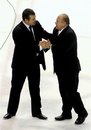 Vancouver Canucks coach Alain Vigneault, left, and Nashville predators coach Barry Trotz shake hands after Game 6 of a second-round NHL Stanley Cup playoff hockey series Monday, May 9, 2011, in Nashville, Tenn. Vancouver won 2-1, and took the series four games to two.