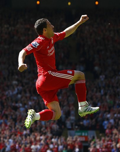 Liverpool's Maxi Rodriguez Celebrates