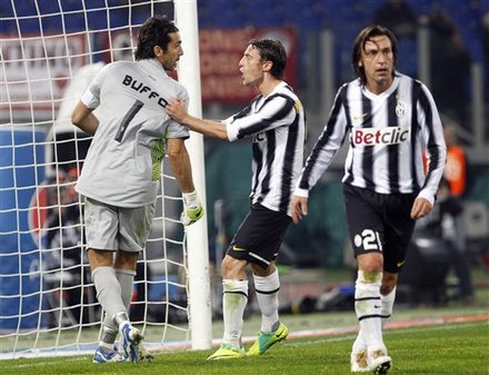 Juventus' Golkeeper Gianluigi Buffon, Left, Is