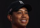 U.S. golfer Tiger Woods attends a news conference as part of his Asian tour at Mission Hill Dongguan club house, in Dongguan, southern China's Guangdong province, Tuesday, April 12, 2011.  Woods will visit Beijing and Seoul during the tour.