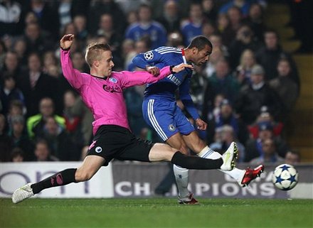 FC Copenhagen's Oscar Wendt, Left, And Chelsea's Ashley Cole Battle For The Ball