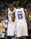 Oklahoma City Thunder forward Kevin Durant , left, celebrates with James Harden , right, following a basket by Harden in the fourth quarter of an NBA basketball game against the Phoenix Suns in Oklahoma City, Sunday, March 6, 2011. Oklahoma City won 122-118.