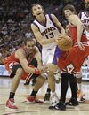 Phoenix Suns ' Steve Nash (13) drives against Chicago Bulls ' Joakim Noah , left, and Kyle Korver during the first overtime of an NBA basketball game Wednesday, Nov. 24, 2010, in Phoenix. The Bulls won 123-115 in double overtime.