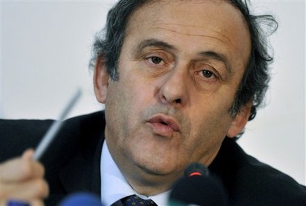 FILE - Wednesday, Dec. 8, 2010 file photo of FIFA Vice President Michel Platini as he talks during a press conference in Budapest, Hungary. FIFA Vice President Michel Platini wants Qatar to share 2022 World Cup hosting duties with its Gulf neighbors. Platini, who is also president of UEFA, did not specify which other countries Qatar could invite to stage matches, but said there was time to reach agreements.