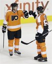 Philadelphia Flyers ' Jakub Voracek , left, and Jaromir Jagr , both of Czech Republic, celebrate after a preseason NHL hockey game against the New York Rangers , Monday, Sept. 26, 2011, in Philadelphia. Philadelphia won 5-3.