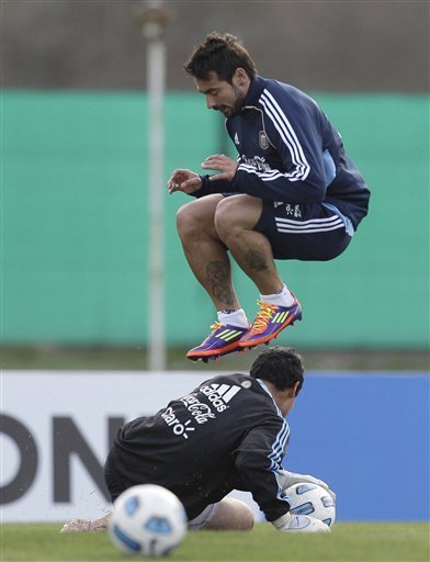 Argentina''s Ezequiel Lavezzi Jumps