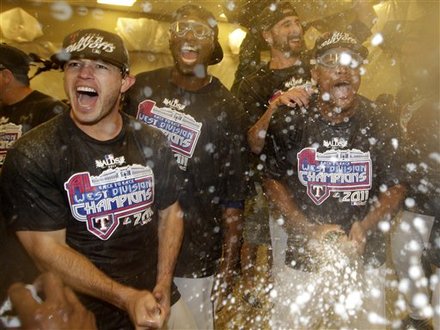 Texas Rangers' Ian Kinsler, Left, And Adrian Beltre, Right, Celebrate With Teammates