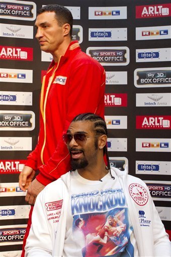 WBO And IBF Champion Wladimir Klitschko, Standing, And WBA Champion David Haye Attend A News