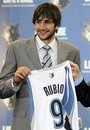 Ricky Rubio of Spain, the Minnesota Timberwolves 2009 first round draft pick, holds up a jersey during an introductory basketball news conference, Tuesday, June 21, 2011 in Minneapolis. Rubio signed to a multi-year contract with the NBA basketball team.