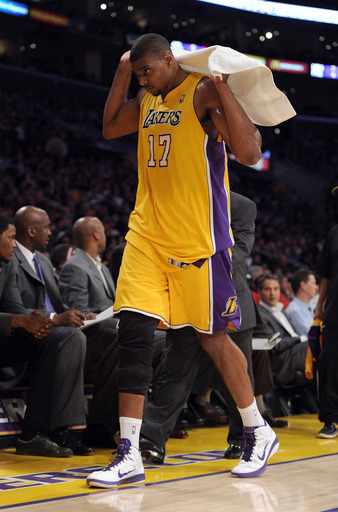 Lakers center Andrew Bynum leaves the court after injuring his knee during the second quarter against the Spurs.
