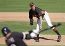 San Francisco Giants starting pitcher Barry Zito(notes), right, reacts as Chicago White Sox&#39;s A.J. Pierzynski(notes) swings and misses a pitch during the fifth inning of their spring training baseball game in Scottsdale, Ariz., Wednesday, March 9, 2011.