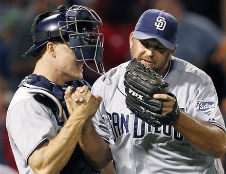 San Diego Padres Relief Pitcher Heath Bell And Catcher Nick Hundley Celebrate