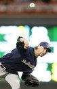 Milwaukee Brewers pitcher John Axford throws during the ninth inning of a baseball game against the Minnesota Twins , Saturday, July 2, 2011 in Minneapolis. The Brewers won 8-7.