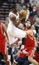 Portland Trail Blazers ' Wesley Matthews (2) passes the ball as Houston Rockets ' Luis Scola , of Argentina, defends in the first quarter during an NBA basketball game Tuesday, March 1, 2011, in Portland, Ore.