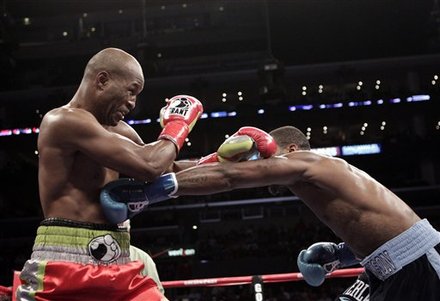 Bernard Hopkins, Left, And Chad Dawson Trade Punches In The First Round Of A Light Heavyweight Boxing Match In Los