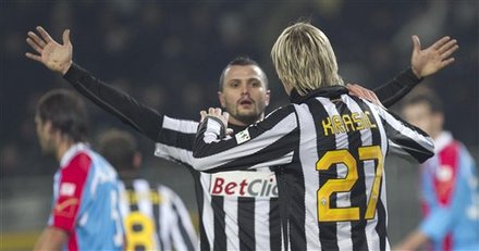 Juventus' Milos Krasic, Of Serbia, Right, Is