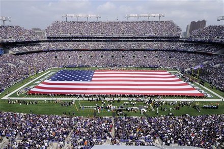 An American Flag Is Unfurled Onto The Field At M&T Bank Stadium To Honor The 10 Year Anniversary Of The Sept. 11, 2001,
