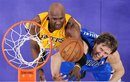 Los Angeles Lakers forward Lamar Odom , left, and Dallas Mavericks forward Dirk Nowitzki of Germany battle for a rebound during the second half in Game 1 of a second-round NBA playoff basketball series, Monday, May 2, 2011, in Los Angeles. The Mavericks won 96-94.