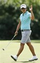 Yani Tseng, of Taiwan, waves after a birdie on the fifth hole during the third round of the LPGA Kraft Nabisco Championship golf tournament in Rancho Mirage, Calif., Saturday, April 2, 2011.