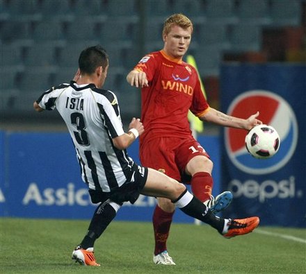 AS Roma's John Riise Of Norway, Right, Is