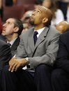 New Orleans Hornets coach Monty Williams, foreground, looks at the clock in the second half of an NBA basketball game against the Philadelphia 76ers , Sunday, Dec. 12, 2010, in Philadelphia. The 76ers won 88-70.