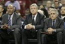 Sacramento Kings head coach Paul Westphal, center, watches the closing moments of the Kings 104-83 loss to the Miami Heat , with assistant coaches Mario Ellie, left, and Jim Eyen in an NBA basketball game in Sacramento, Calif., Saturday, Dec. 11, 2010.