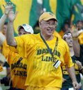 Baylor University President Kenneth Starr runs onto the field before the Baylor NCAA college football game against TCU in Waco, Texas, Friday, Sept. 2, 2011. Baylor won 50-48.