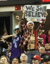 A pair of fans of the Sacramento Kings show their support during a timeout in the fourth quarter of the Kings 84-79 loss to the Milwaukee Bucks in an NBA basketball game in Sacramento, Calif., Thursday, Dec. 23, 2010. The Kings 5-22 record is the worst in the NBA.