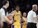 Los Angeles Lakers center Andrew Bynum , center, looks on after he was ejected from the game during the second half of an NBA basketball game with the Minnesota Timberwolves in Los Angeles, Friday, March 18, 2011. The Lakers won 106-98. (AP Photo)