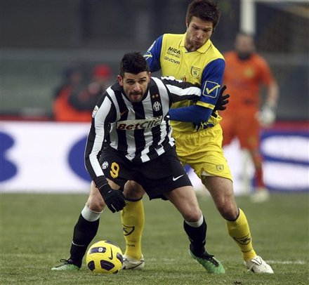 Juventus' Vincenzo Iaquinta, Left, Is