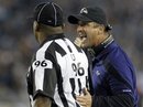 Baltimore Ravens head coach John Harbaugh, right, pleads his case with umpire Undrey Wash (96) during the second half of an NFL football game against the Jacksonville Jaguars in Jacksonville, Fla., Monday, Oct. 24, 2011. The Jaguars won 12-7.