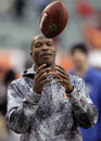 Cincinnati Bengals wide receiver Chad Ochocinco tosses a ball during warmups before an NFL football game against the San Diego Chargers , Sunday, Dec. 26, 2010, in Cincinnati. Ochocinco was inactive for the game with an ankle injury.