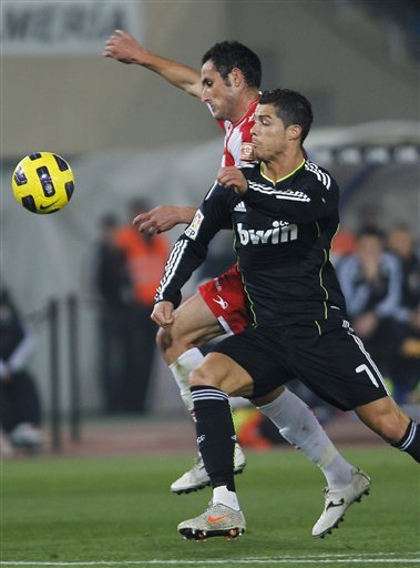 Real Madrid's Cristiano Ronaldo From Portugal, Right, Vies