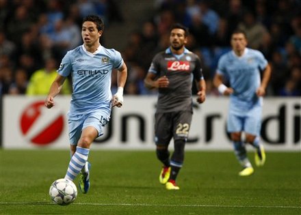 Manchester City's Samir Nasri, Left, In Action Against Napoli