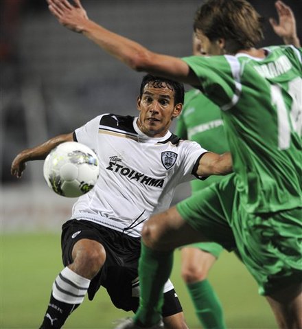 PAOK's Diego Alejandro Arias, Left, Challenge For The Ball With Andrei Voronkov, Right, Of Karpaty Lviv Of Ukraine