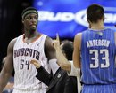 Charlotte Bobcats ' Kwame Brown (54) reacts after being charged with a technical foul after an altercation in the second half of the Magic's 111-102 win in an NBA basketball game in Charlotte, N.C., Wednesday, April 6, 2011. Orlando Magic coach Stan Van Gundy, center, and Magic's Ryan Anderson , right, look on.